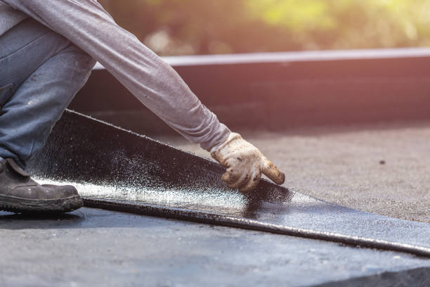 Professional Waterproofing technician working in Carrollton, AL